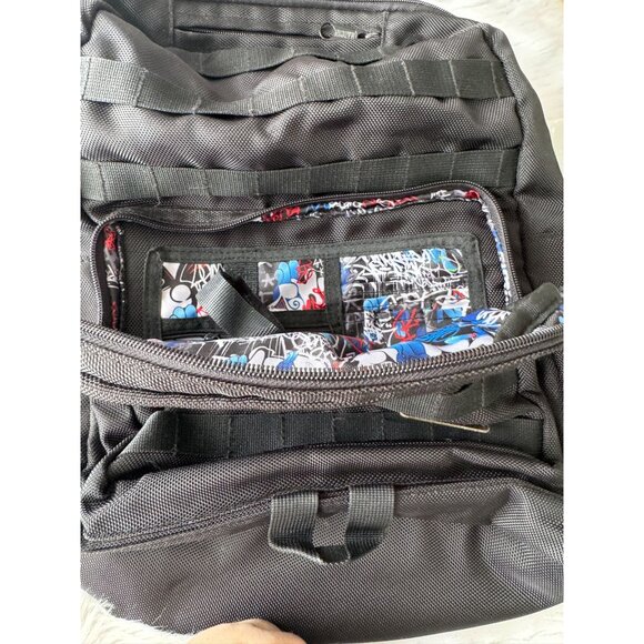 Steve Madden Desert Storm Black Canvas Backpack with Graffiti Interior - Picture 7 of 12